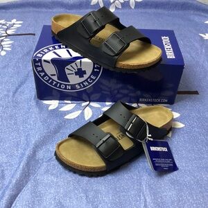 Birkenstock Black Sandals with Leather Straps and Contoured Footbed
